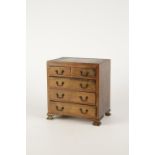 A MINIATURE GEORGE I STYLE CHEST OF DRAWERS