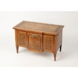 AN ITALIAN MINIATURE MARQUETRY COMMODE