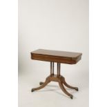 A REGENCY MAHOGANY TEA TABLE