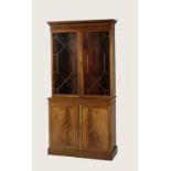 A GEORGE III STYLE MAHOGANY LIBRARY CABINET