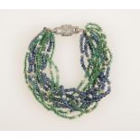 AN ART DECO EMERALD AND SAPPHIRE BEAD BRACELET