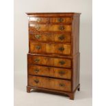A GEORGE I WALNUT VENEERED CHEST ON CHEST