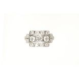 AN ART DECO STYLE DIAMOND DRESS RING