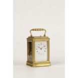 A FRENCH GILT BRASS REPEATING CARRIAGE CLOCK