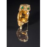 CARTIER: A CITRINE, EMERALD AND DIAMOND OWL BROOCH