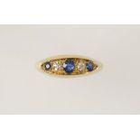 A SAPPHIRE AND DIAMOND GYPSY STYLE DRESS RING