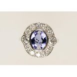 A TANZANITE AND DIAMOND DRESS RING