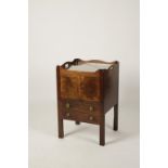 A GEORGE III MAHOGANY COMMODE