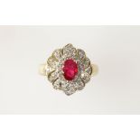 A RUBY & DIAMOND CLUSTER RING