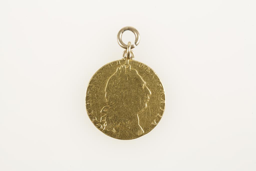 A GEORGE III GUINEA 1798 mounted as a pendant