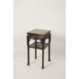 A CHINESE HARDWOOD AND MARBLE STAND