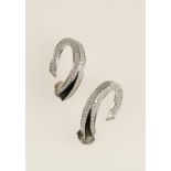 CARTIER: A PAIR OF DIAMOND ENCRUSTED LOOPS