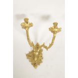 A CARVED GILTWOOD TWO-BRANCH WALL SCONCE
