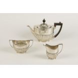 AN EDWARDIAN THREE PIECE TEA SET