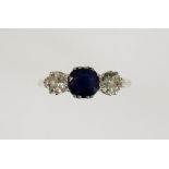 A SAPPHIRE AND DIAMOND THREE STONE DRESS RING