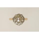 A DIAMOND AND PEARL DRESS RING