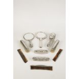 A COLLECTION OF DRESSING TABLE BRUSHES, MIRRORS AND CONTAINERS