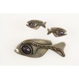 A MODERNIST STERLING SILVER FISH BROOCH