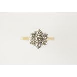 A DIAMOND CLUSTER RING