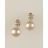 A PAIR OF CULTURED PEARL AND DIAMOND EARRINGS