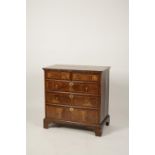 A GEORGE I WALNUT CHEST OF DRAWERS