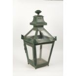 A GREEN FINISHED METAL AND GLASS HALL LANTERN
