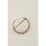 A LATE VICTORIAN DIAMOND-SET CRESCENT BROOCH