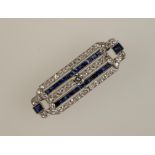 AN ART DECO SAPPHIRE AND DIAMOND BROOCH