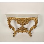 A ROCOCO STYLE GILTWOOD AND MARBLE CONSOLE TABLE