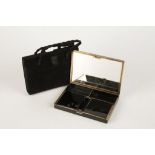 CARTIER: A simulated black onyx evening bag