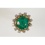A GREEN CABOCHON HARDSTONE AND DIAMOND DRESS RING,