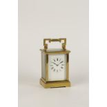 A FRENCH BRASS CASE STRIKING CARRIAGE CLOCK