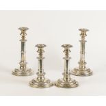 A SET OF FOUR GEORGE IV TELESCOPIC CANDLESTICKS