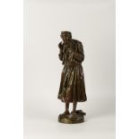 BOFILL: "ARABE EN PRIERE" A cast and patinated bronze of a standing figure