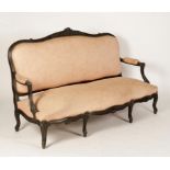 A NAPOLEON III EBONISED AND UPHOLSTERED SETTEE