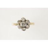 A DIAMOND FLOWERHEAD RING