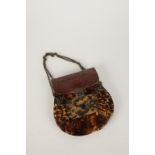 A TORTOISESHELL AND LEATHER PURSE