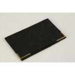 AN ASPREY & CO. GOLD MOUNTED BLACK SILK PURSE