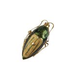 A SCARAB BEETLE BROOCH