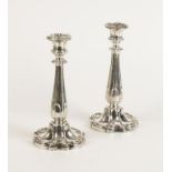 A PAIR OF VICTORIAN CANDLESTICKS