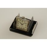 DUNHILL: A LADIES BLACK ENAMEL PURSE WATCH