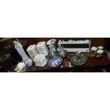 A PAIR OF GLASS OIL JARS in a plated stand, two French storage jars and similar items