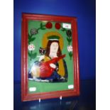 A NAIVE REVERSE PAINTED ON GLASS HOLY PICTURE in a red painted frame, possibly Romanian