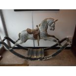 A LARGE 19TH CENTURY ROCKING HORSE with original paint-work on a traditional painted pine rocker