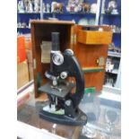 A HAWKSLEY & SON MICROSCOPE in fitted case with fittings