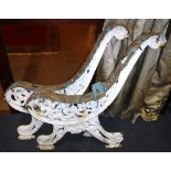 A PAIR OF VICTORIAN CAST IRON BENCH ENDS