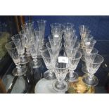 A LARGE COLLECTION OF 19TH CENTURY FACET-CUT DRINKING GLASSES