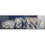 A LARGE COLLECTION OF DRINKING GLASSES with panel cut bowls