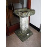 A RECONSTITUTED STONE BIRD BATH of square form