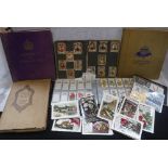 A LARGE QUANTITY OF STAMPS including presentations packs, similar cigarette cards and other items